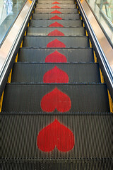 Heart Patterns Displayed on an Escalator Creating a Unique and Colorful Experience