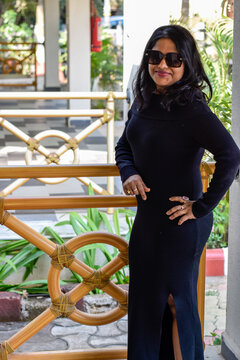 Indian female model in black dress posing for photo graph