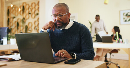 Fototapeta premium Research, glasses and laptop with business man in office for event planner, reading and client feedback. Online, project management and startup with person in creative agency for email and idea