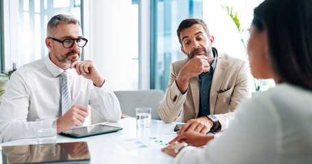 Interview, discussion and business people in office for recruitment process with candidate. Questions, meeting and team of HR professionals with applicant for resume review for hiring or job search.