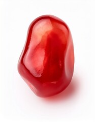 Close-up of a single, juicy pomegranate seed.  Rich red color against a white background.