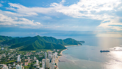 Stunning Aerial View of Santa Marta, Magdalena, Colombia Showcasing Lush Mountains and Coastal...