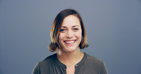 Confident, woman and happy for portrait in studio with ambition, creative career and designer job....
