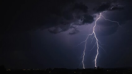 A dark and stormy night with lightning illuminating the sky, weather, lightning, thunder