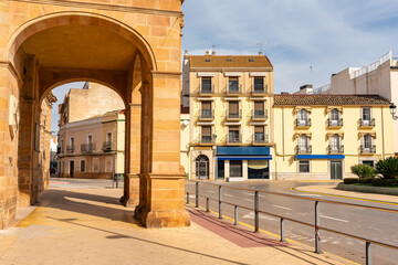 Arch and arcades of the neoclassical building of the town hall of Linares in Jaen, Andalusia.