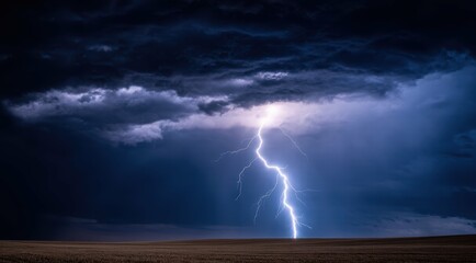 Fototapeta premium A dramatic lightning strike illuminates a stormy sky.