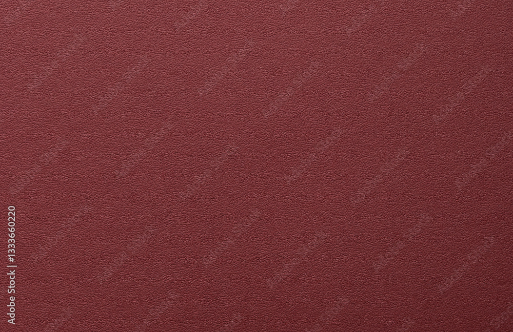 Poster burgundy paper background with a matte texture and fine, tactile surface. deep, rich red tones creat