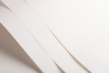 White and beige vellum paper background with a creamy, thin texture. Warm off-white tones create an elegant, luxurious finish, perfect for minimalistic, artistic stationery and decorative compositions