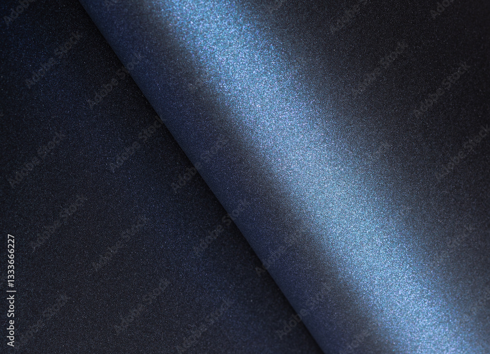 Poster navy blue paper background with a smooth, pearlescent texture and rolled edges. deep, dark tones wit