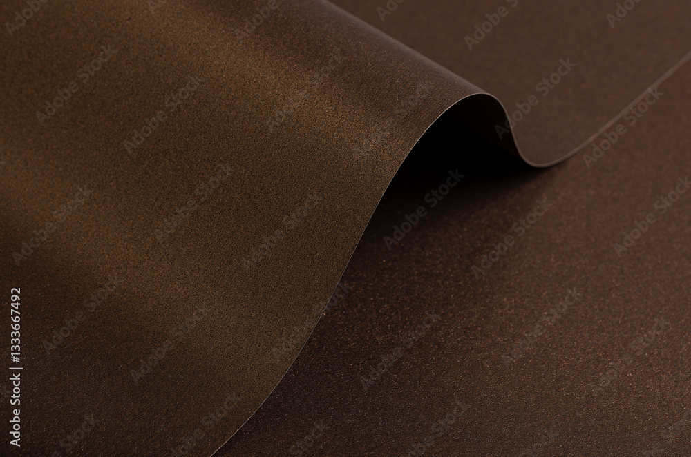 Poster warm brown paper background with a smooth, grainy texture and metallic bronze shimmer. a subtle grad