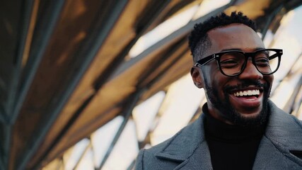 The Smiling Man in Glasses