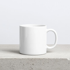 Fototapeta premium plain white mug on concrete surface, showcasing modern design. Ideal for coffee or tea lovers, this versatile mug adds minimalist touch to any setting