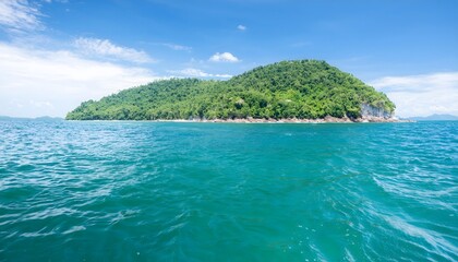 Fototapeta premium Beautiful Island Surrounded by Turquoise Waters and Blue Sky
