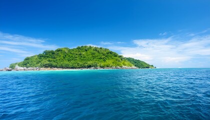 Fototapeta premium Summer Ocean View with Lush Green Island and Bright Sky