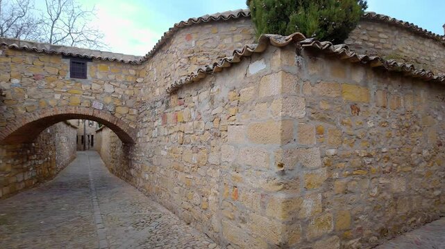 Beautiful stone village with arches in the narrow streets in Baeza, a World Heritage Site