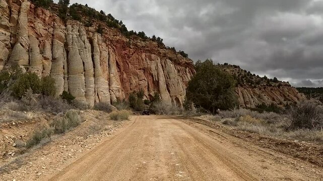 Utah sandstone mountain desert trail off road recreation POV 4K. Recreation off road, nature exploring. Desert mountain canyon valley trail ride area. Rocky, forest, desert hill, river crossings.