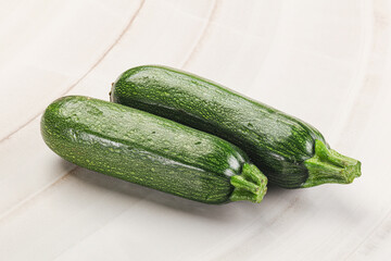 Raw green ripe zucchini vegetable