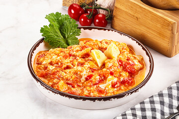 Shakshuka with tomato for breakfast