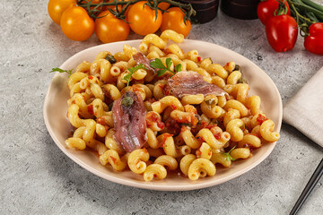 Italian pasta cellentani with anchovy