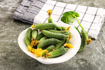 Raw gherkin cucumbers in the bowl