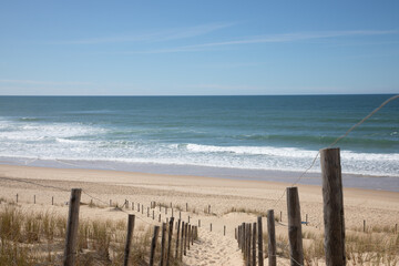 Beach pathway access on sand fence access sea in ocean atlantic grand crohot coast in lege...
