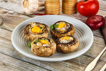 Baked champignon with quail egg