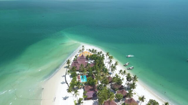 Experience the breathtaking beauty of Koh Mook Island, Thailand, where pristine white sands and turquoise waters create a serene escape. Explore lush palm trees and tranquil vibes.