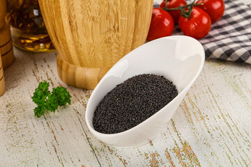 Black dry Nigella seeds in the bowl