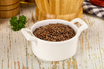 Brown flax seeds in the bowl