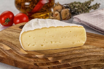 Soft brie cheese with mold