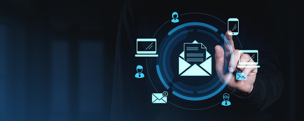 Digital communication network with email icons and devices.