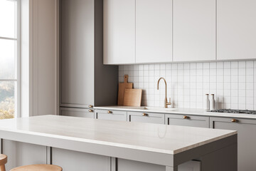 Modern minimalist kitchen with a light gray and white color scheme. 3D Rendering