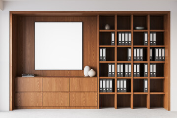 Blank framed poster mockup on wooden office wall with organized shelves. 3D Rendering