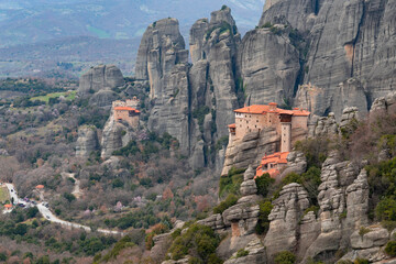 Meteora landscape with Saint Nikolaos and Roussanou monasteries on top of giant natural pillars, Kalabaka, Greece