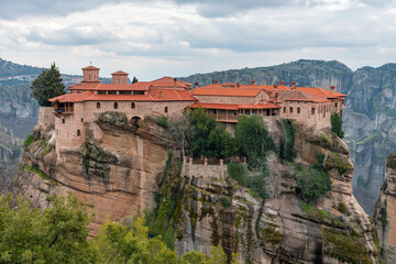 Meteora landscape with Saint Varlaam monastery on top of giant natural pillars, Kalabaka, Greece