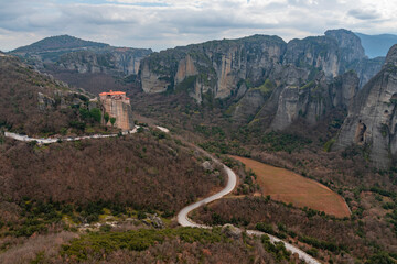 Meteora landscape with Roussanou monastery on top of giant natural pillars, Kalabaka, Greece