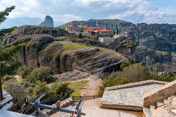 Meteora landscape with Holy Trinity monastery on top of giant natural pillars, Kalabaka, Greece