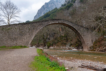Saint Vissarion stone arched bridge (Porta, Portaikos) near Pyli village, Thessaly, Greece