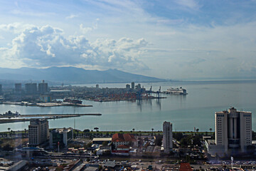  Cityscape at sunset with bay view

Description: The photo shows a panoramic view of the city from...