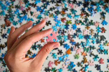 Holding a Puzzle Piece - Symbol of Problem Solving and Completion