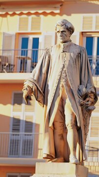 View of the Lord Brougham Statue on the street in daylight in Cannes, France