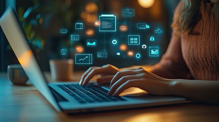 Woman working on laptop with digital interface showing data analytics and cloud computing