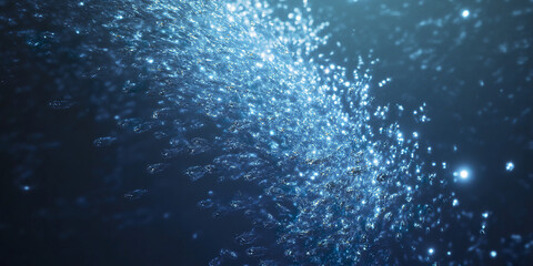 swirling school of tiny neon fish glowing underwater