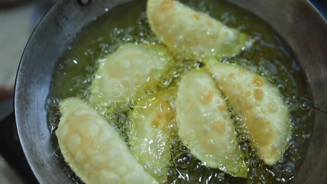 Ghujhiya or gujhiya a dessert made in holi in india