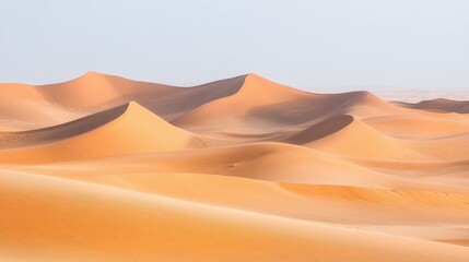 Sunlit desert dunes create a mesmerizing landscape