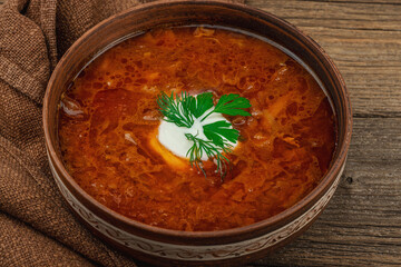 Traditional Ukrainian borscht. Hot dish, national red soup, served in classic style.