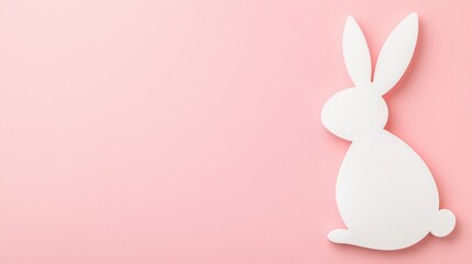 Minimalist Easter design with white bunny silhouette on pink background and empty space for text placement