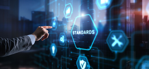 Businessman clicks Standards Quality assurance and control concept