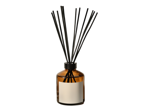 Incense sticks in a decorative vase with flowers on a white background.