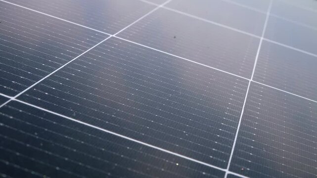 Solar panels on the roof of an apartment building. Solar power plant on the roof. An association of co-owners of apartment buildings installs solar panels on the roofs of their buildings. 